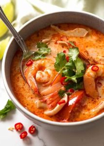 Tom Yum Soup (Spicy Thai broth with shrimp, mushroom, lemongrass, and lime)