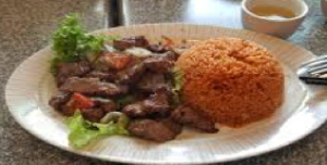 ARROZ TOMATE COM BIFE (Beef Steak with Tomato Rice, served with Green Salad)