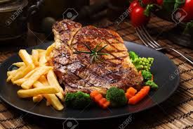 Beef Sirloin Chop Steaak ( Chopped beef sirloin served with mix vegetables , served with rice or french fries)