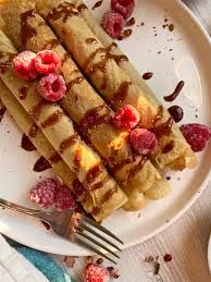 CASSAVA FLOUR (crepes made with our gluten-free flour of cassava and Maliana rice, mixed with egg and fresh coconut milk, served with banana and melted palm sugar)