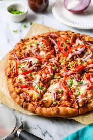 Chicken pizza (pizza based sauce, chicken slices, onion, capsicum & cheese)