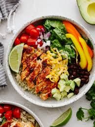 Chicken Burrito Bowl ( Mexican spicy chicken,Rice , Beans,Lettuce,Tomato,Avocado,Sweet corn and Chili Yoghurt Dressing ) Mexican Lime 