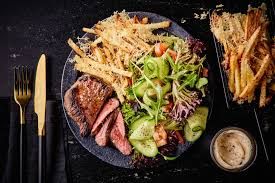 Beef Sirloin Steak ( Premium Beef sirloin steak with salad, served with rice or french fries )