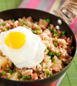 Fried rice with fried egg and prawn crackers