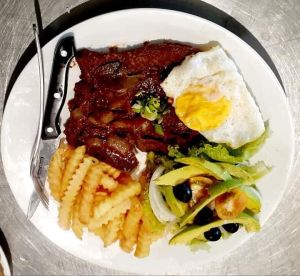 BiTOQUE ( Portuguese steak served with green salad and chips/rice )