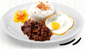 Tapsilog ( Marinated beef with garlic-fried rice , sunny side up egg & pickled papaya )
