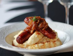 Bangers and mash-beef sausage with mash potato, onion and gravy