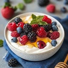 AGORA YOGHURT + FRUITS BOWLS (we make our own Greek yoghurt using a special live culture . Topped with seasonal fruits, raw laclubar honey, grated coconut, oats and purple sweet potato)