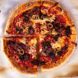 Pizza Sicilian (Tomato Sauce, Mozzarella, Pepperoni, Onion, Garlic, Olives, Anchovies)