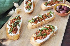 Bruschetta Olive tapenade with sun dried tomato and ricotta cheese
