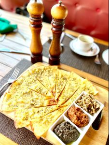Trio of Dips ( with crisp home made bread, sardella, olive tapenada and pickled eggplant dips)