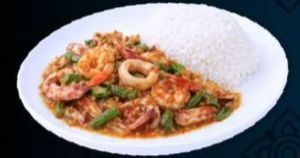 Stir Fried Seafood With Red  Curry Pate and Rice 